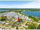 Aerial view of property near lake and community at 2233 20Th Nw St, Winter Haven, FL 33881