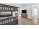 Bedroom with bunk beds, dresser, and TV at 2233 20Th Nw St, Winter Haven, FL 33881
