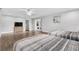 Large bedroom with two beds and access to patio at 2233 20Th Nw St, Winter Haven, FL 33881