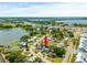Aerial view showing home's location near a lake and neighborhood at 2233 20Th Nw St, Winter Haven, FL 33881