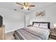 Bedroom with a queen bed and ceiling fan at 2233 20Th Nw St, Winter Haven, FL 33881