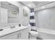Clean bathroom with white vanity and bathtub at 2233 20Th Nw St, Winter Haven, FL 33881