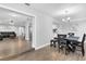 Bright dining room featuring a dark wood table and six chairs at 2233 20Th Nw St, Winter Haven, FL 33881