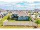 Home features a fenced-in backyard with patio at 731 Griffon Ave, Lake Alfred, FL 33850