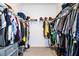 Large walk-in closet with double hanging rods and shelving at 731 Griffon Ave, Lake Alfred, FL 33850