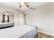 Simple bedroom with a full-size bed and mirrored closet doors at 5144 Washington St, Lake Wales, FL 33859