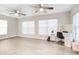 Large bedroom with two ceiling fans and plenty of natural light at 5144 Washington St, Lake Wales, FL 33859
