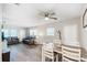 Dining area with table and chairs, open to living room at 5144 Washington St, Lake Wales, FL 33859