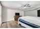 Well-lit bedroom with a queen bed and ample closet space at 5144 Washington St, Lake Wales, FL 33859