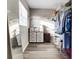 Large walk-in closet with shelving and hanging rods at 5144 Washington St, Lake Wales, FL 33859