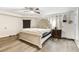 Bright bedroom featuring a comfortable bed and plenty of floor space at 5144 Washington St, Lake Wales, FL 33859