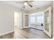 Spacious bedroom with French doors leading to sunroom at 5144 Washington St, Lake Wales, FL 33859