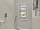 Laundry area with window and hookups for washer and dryer at 1127 N Stella Ave, Lakeland, FL 33805