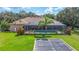 Property features a large pool, workshop and fenced-in backyard at 3933 Mammoth Grove Rd, Lake Wales, FL 33898