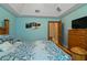 Bright bedroom with king-size bed and vaulted ceiling at 3933 Mammoth Grove Rd, Lake Wales, FL 33898
