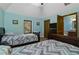 Charming bedroom with two twin beds and a ceiling fan at 3933 Mammoth Grove Rd, Lake Wales, FL 33898