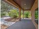 Covered patio with access to the backyard at 3933 Mammoth Grove Rd, Lake Wales, FL 33898