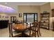 Formal dining room showcasing a large wood table and pool view at 3933 Mammoth Grove Rd, Lake Wales, FL 33898