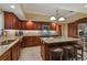 Eat-in kitchen with granite countertops and stainless steel appliances at 3933 Mammoth Grove Rd, Lake Wales, FL 33898