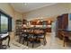Spacious kitchen with granite countertops and dark wood cabinets at 3933 Mammoth Grove Rd, Lake Wales, FL 33898