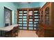 Home office with built-in shelving and window seat at 3933 Mammoth Grove Rd, Lake Wales, FL 33898