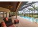 Relaxing pool and patio area with seating at 3933 Mammoth Grove Rd, Lake Wales, FL 33898