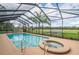 Screened pool and spa with open views at 3933 Mammoth Grove Rd, Lake Wales, FL 33898