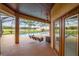 Covered patio with pool, seating, and swing at 3933 Mammoth Grove Rd, Lake Wales, FL 33898