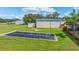 Large solar pool cover for energy efficiency and safety at 3933 Mammoth Grove Rd, Lake Wales, FL 33898