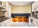 Kitchen features a built-in breakfast nook and plenty of cabinet space at 3933 Strickland Ct, Lakeland, FL 33812