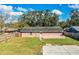 Aerial view of house, backyard, and surrounding properties at 3933 Strickland Ct, Lakeland, FL 33812