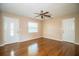 Living room with hardwood floors and ceiling fan at 3933 Strickland Ct, Lakeland, FL 33812