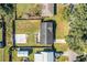 Aerial view showcasing the house and its surroundings at 3933 Strickland Ct, Lakeland, FL 33812