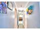 Hallway with doors leading to bedrooms at 5002 Lodgewood Dr, Lakeland, FL 33810