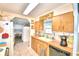 Kitchen with wood cabinets and built-in appliances at 5002 Lodgewood Dr, Lakeland, FL 33810