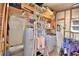 Laundry room with washer, dryer, and ample storage shelves at 5002 Lodgewood Dr, Lakeland, FL 33810