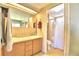 Clean bathroom with double vanity and shower/tub combo at 5002 Lodgewood Dr, Lakeland, FL 33810