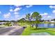 Community features tennis courts, parking, and lake access at 5002 Lodgewood Dr, Lakeland, FL 33810