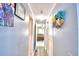 View down a hallway with doors to other rooms at 5002 Lodgewood Dr, Lakeland, FL 33810
