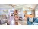 Spacious living room featuring hardwood floors and ample seating at 5002 Lodgewood Dr, Lakeland, FL 33810