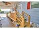Covered patio with ramp access and wooden steps at 5002 Lodgewood Dr, Lakeland, FL 33810