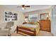 Cozy bedroom with built-in shelving and a comfortable sitting area at 1175 E George St, Bartow, FL 33830