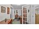 Home office features built-in shelving and French doors at 1175 E George St, Bartow, FL 33830