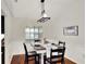 Dining room featuring a rustic table and chandelier at 4009 Carey Ct, Auburndale, FL 33823