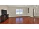 Spacious living area with hardwood floors and recessed lighting at 4009 Carey Ct, Auburndale, FL 33823