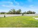 Spacious backyard with a grassy lawn and privacy fence at 451 Sunfish Dr, Winter Haven, FL 33881