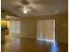 Bright living room with tile floors and sliding glass doors at 5009 Cimarron Dr, Lakeland, FL 33813