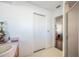 Simple bathroom with a sink, toilet, and view of a bedroom at 941 Devonshire Way, Lake Wales, FL 33853
