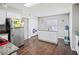 Kitchen boasts granite countertops, white cabinets, and an island at 941 Devonshire Way, Lake Wales, FL 33853