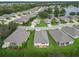 Wide aerial view of the community, including a lake at 2356 Lake James Way, Lakeland, FL 33810